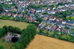 Entrance to the proposed development - With the school field on the left, the first bungalow in Mell Road will be demolished to provide the entrance road to the proposed development.